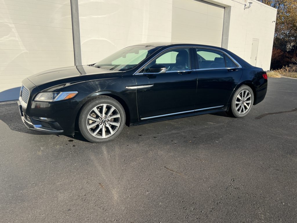 Lincoln Continental black car sedan