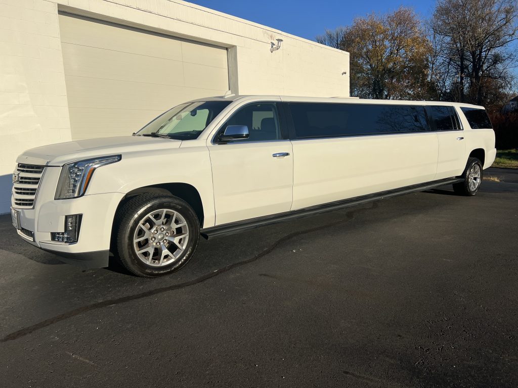Cadillac escalade stretch SUV 12 passenger white Limousine